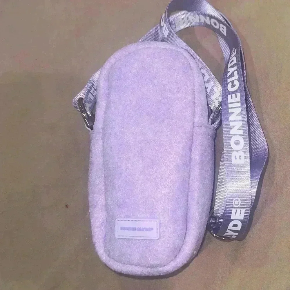 BONNIE CLYDE
Fabric Crossbody Bag - Picture 1 of 8